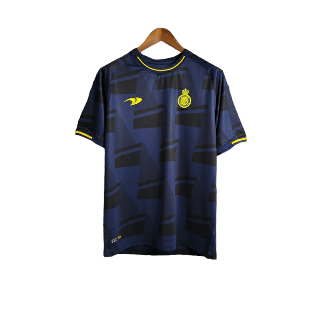 Camisa Al-Nassr Treino 23/24 - Torcedor Dunes Masculina - Azul com detalhes em preto e amarelo