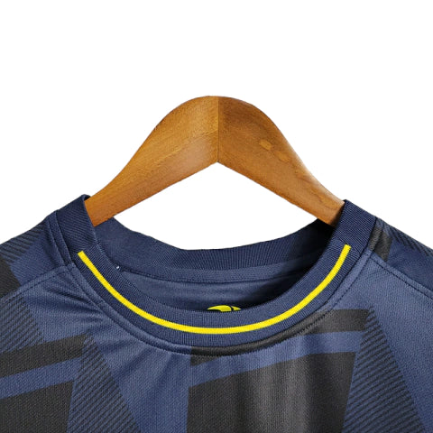 Camisa Al-Nassr Treino 23/24 - Torcedor Dunes Masculina - Azul com detalhes em preto e amarelo