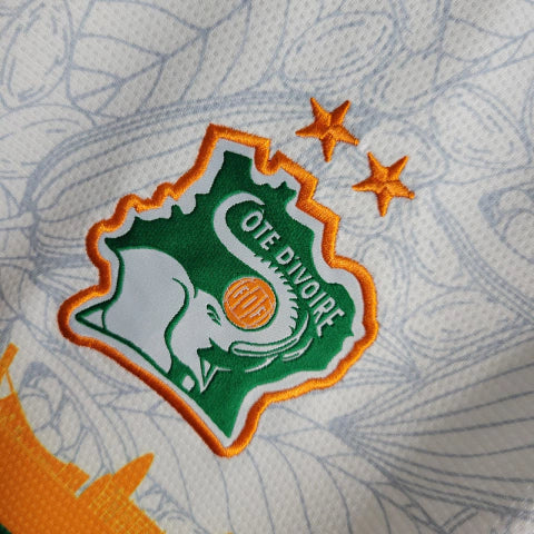 Camisa Seleção Costa do Marfim Edição Especial 22/23 - Torcedor Kelme Masculina - Branca com detalhes em laranja e verde